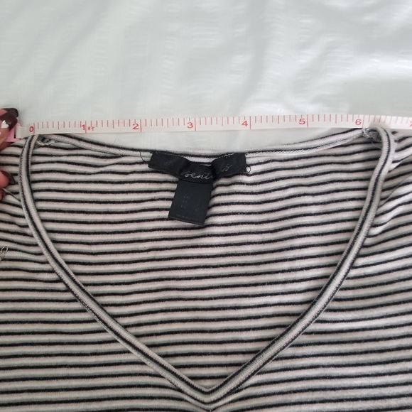 Small, light pink, light grey, white and black ruffly top. - Picture 4 of 9